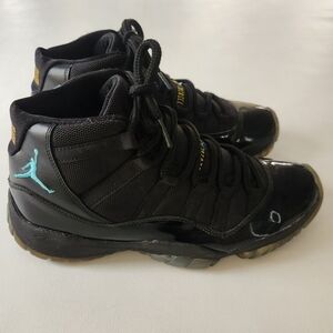 Air Jordan 11 "Gamma" Black Patent Leather Sneakers